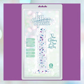 The Glittergasm Dong - Blue and Green Swirl 8" by Icon Brands is a clear, glittery adult toy labeled "glittergasm," featuring "over seven inches," made of body-safe TPR, with "Your Glittery Clear JOE Toy" on pastel, sparkly packaging.